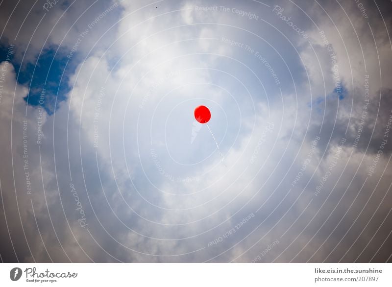 **Make a wish. Sky Clouds Flying Free Blue Red White Perspective Balloon Easy Airy Airmail Copy Space left Copy Space right Copy Space top Copy Space bottom Day
