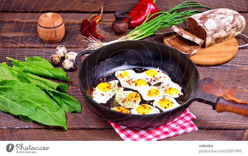 Fried eggs Bread Herbs and spices Breakfast Lunch Dinner Pan Kitchen Restaurant Wood Eating Fresh Delicious Natural Above Green Red Tradition Onion Dish lettuce