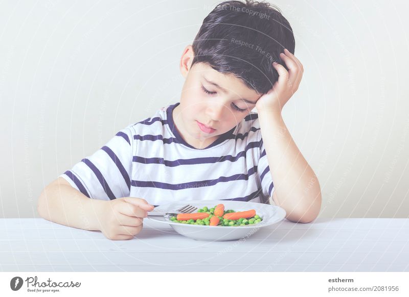 Sad child with a meal Food Vegetable Nutrition Eating Plate Fork Lifestyle House (Residential Structure) Human being Masculine Child Toddler Boy (child) Infancy