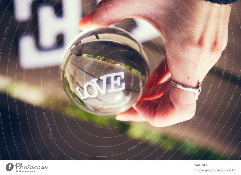 Word LOVE viewed through a crystal ball Lifestyle Valentine's Day Mother's Day Feminine Hand 1 Human being 18 - 30 years Youth (Young adults) Adults Nature