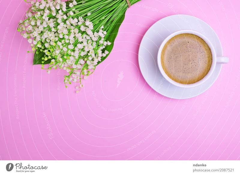 Cup of coffee Breakfast To have a coffee Beverage Coffee Mug Table Flower Bouquet Hot Above Green Pink White drink Lily of the valley Top cup Saucer Fragrant