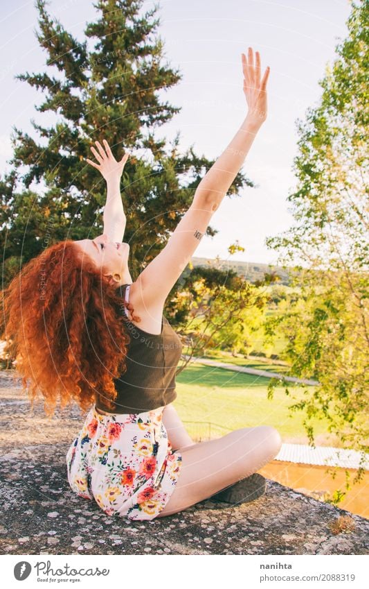 Young redhead woman raising her arms Lifestyle Body Healthy Athletic Wellness Harmonious Well-being Relaxation Meditation Vacation & Travel Adventure Freedom