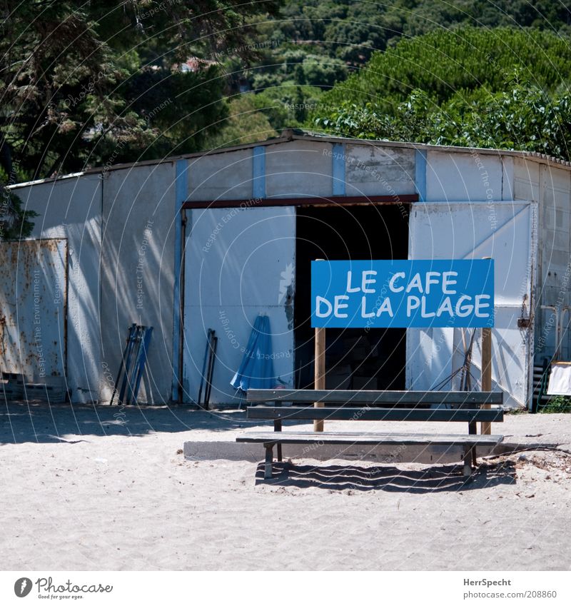 bienvenue Beautiful weather Beach Characters Signs and labeling Trashy Gloomy Blue Brown Green Disappointment Café Bench Open Colour photo Exterior shot