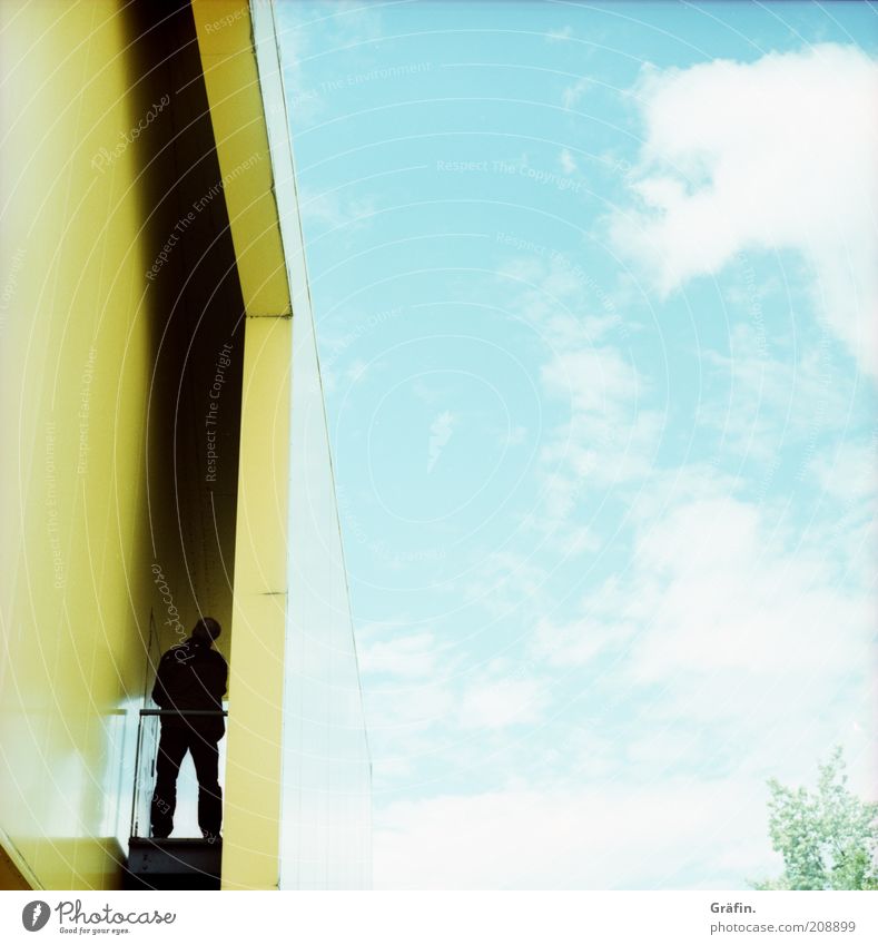 [H 10.1] Black man in the yellow pavilion Dream house Human being Masculine Sky Clouds Expo 2000 House (Residential Structure) Pavilion Facade Stand Bright Blue