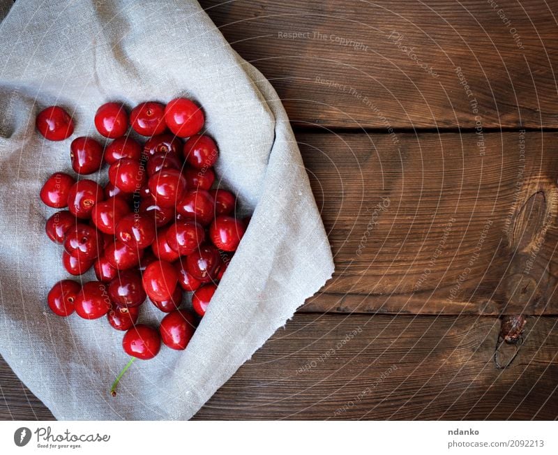 Ripe sweet cherry on a gray tablecloth Fruit Dessert Eating Vegetarian diet Juice Summer Garden Table Nature Wood Fresh Natural Above Retro Juicy Red ripe many