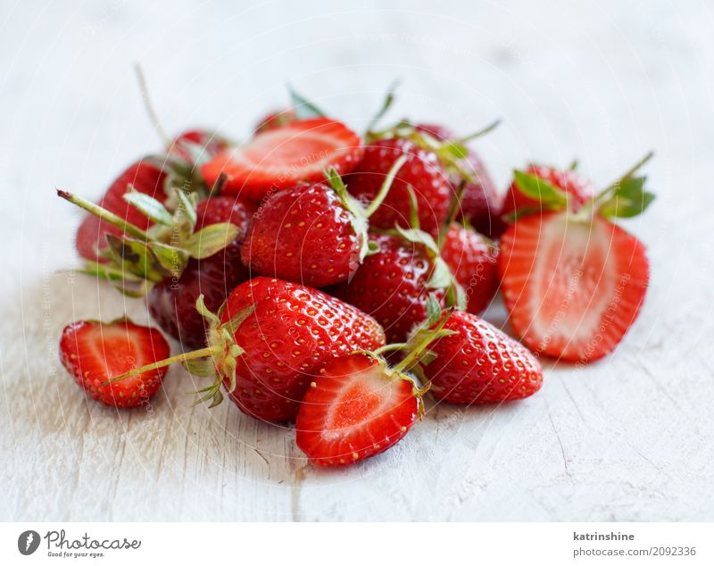 Strawberries close up on a white wooden table Fruit Dessert Diet Summer Table Wood Fresh Bright Delicious Natural Juicy Red White Colour Berries colorful Edible