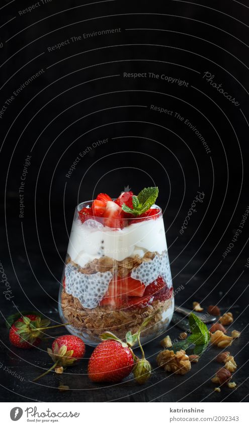 Chia pudding Strawberry parfait with greek yogurt and nuts Yoghurt Fruit Dessert Breakfast Diet Glass Spoon Dark Red White Berries Cereal chia Pudding seed