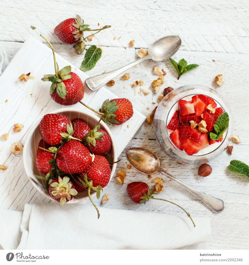 Chia pudding Strawberry parfait with greek yogurt and nuts Yoghurt Fruit Dessert Breakfast Diet Bowl Glass Spoon Red White Berries Cereal chia Pudding seed