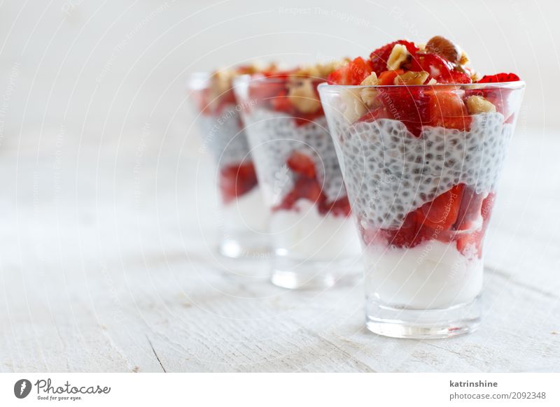 Chia pudding Strawberry parfait with greek yogurt and nuts Yoghurt Fruit Dessert Breakfast Diet Glass Red White Berries Cereal chia Pudding seed Dairy Gourmet