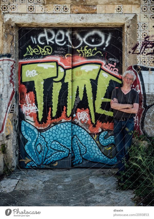 TIME is on his side Human being Masculine Man Adults 1 45 - 60 years Art Work of art Painting and drawing (object) Street art Graffiti Gate Wall (barrier)