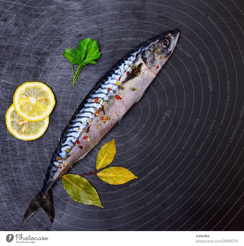 Whole fresh mackerel with spices Seafood Herbs and spices Table Gastronomy Animal Wood Dark Fresh Naked Natural Green Black Mackerel Meal Top cook background