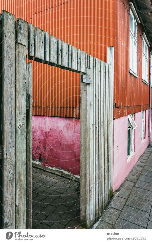 Reykjavik Town Capital city Port City Downtown Deserted Detached house Wall (barrier) Wall (building) Facade Window Door Street Old Gray Orange Pink
