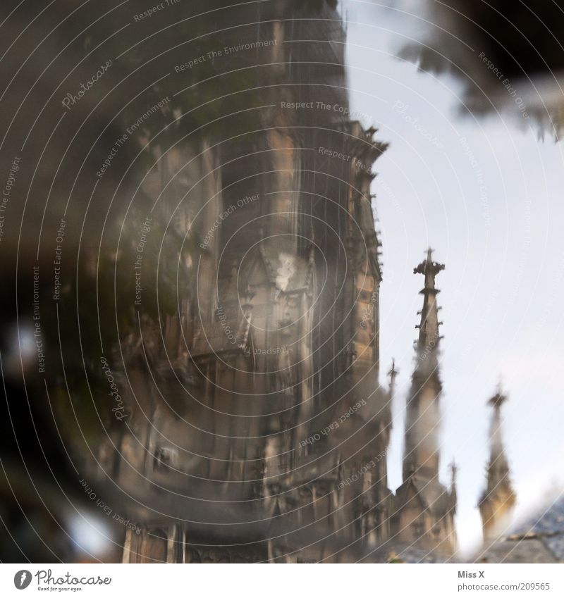 Ulm Cathedral Tourism Sightseeing City trip Church Dome Tourist Attraction Landmark Wet Tower Gothic period Puddle Water Colour photo Exterior shot Experimental