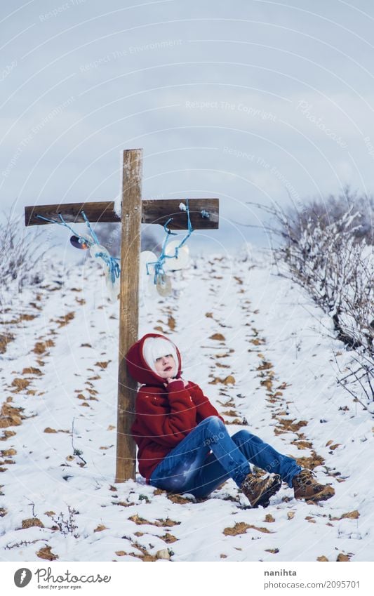 Young woman near a cross in a winter day Style Design Human being Feminine Youth (Young adults) 1 18 - 30 years Adults Environment Nature Plant Winter Climate