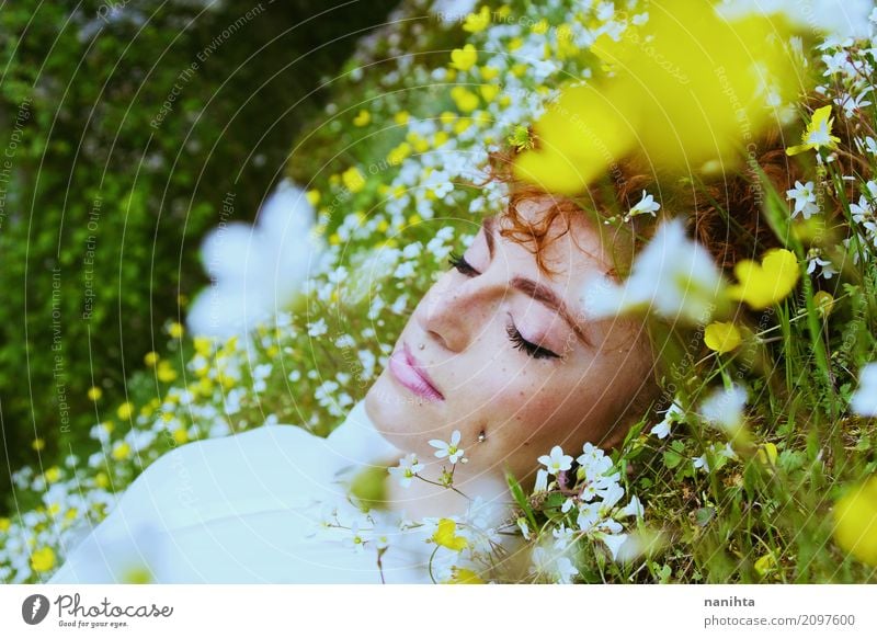 Young woman sleeping in a field of flowers Lifestyle Joy Face Freckles Wellness Well-being Senses Relaxation Meditation Fragrance Vacation & Travel Freedom