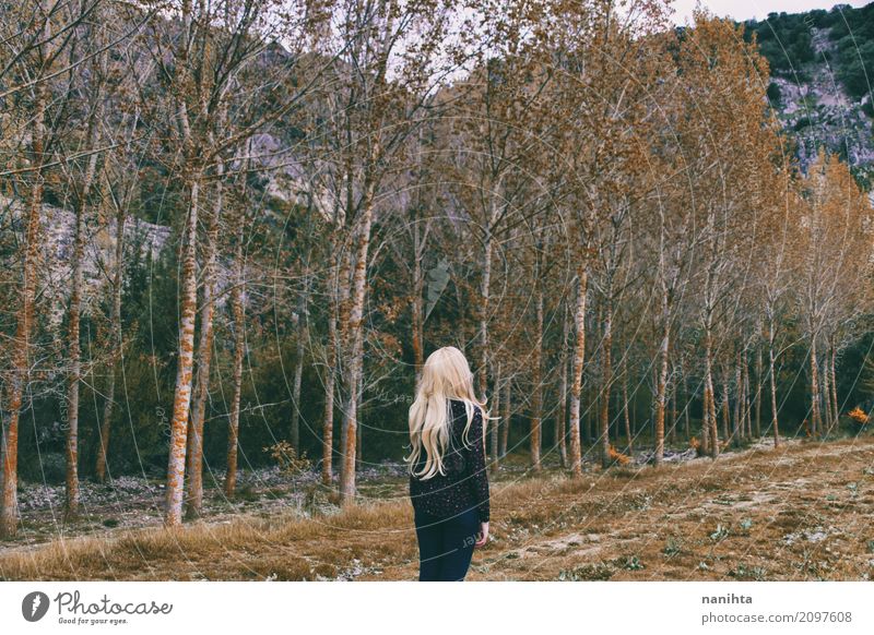Blonde woman alone in a forest Lifestyle Harmonious Senses Relaxation Meditation Human being Feminine Young woman Youth (Young adults) 1 18 - 30 years Adults
