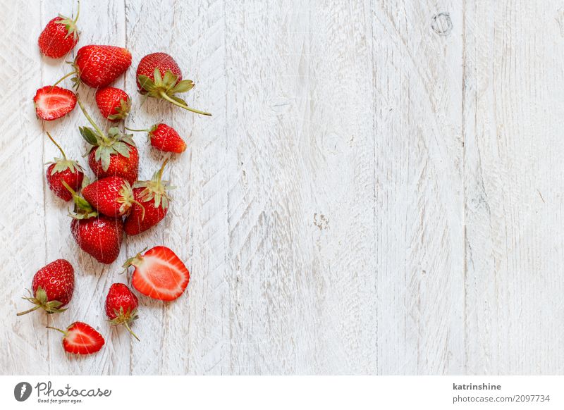 Strawberries on a white wooden table top view Fruit Dessert Diet Summer Table Wood Fresh Bright Delicious Natural Juicy Brown Red Colour Berries Tray colorful