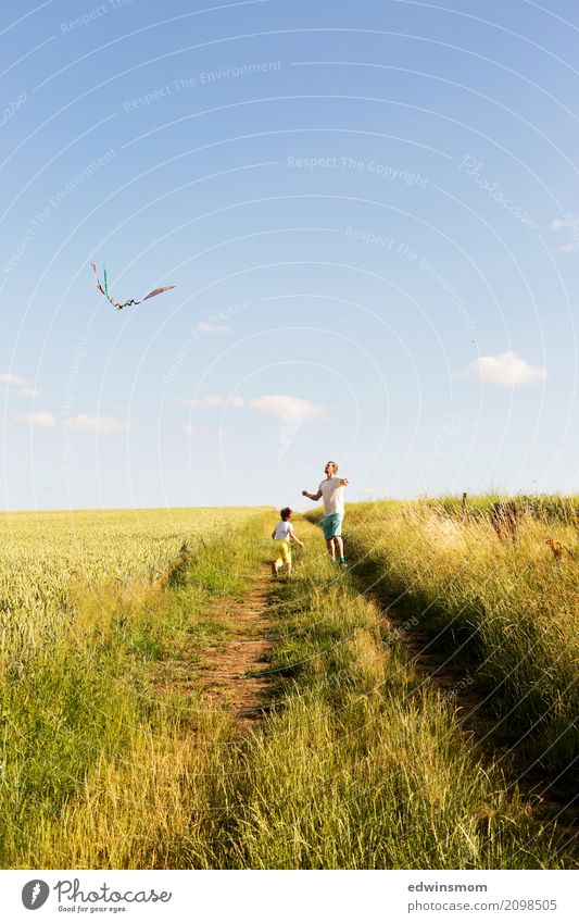 It's the most beautiful outdoors. Leisure and hobbies Playing Summer Masculine 2 Human being Nature Field Kite Observe Movement Flying Walking Running Looking