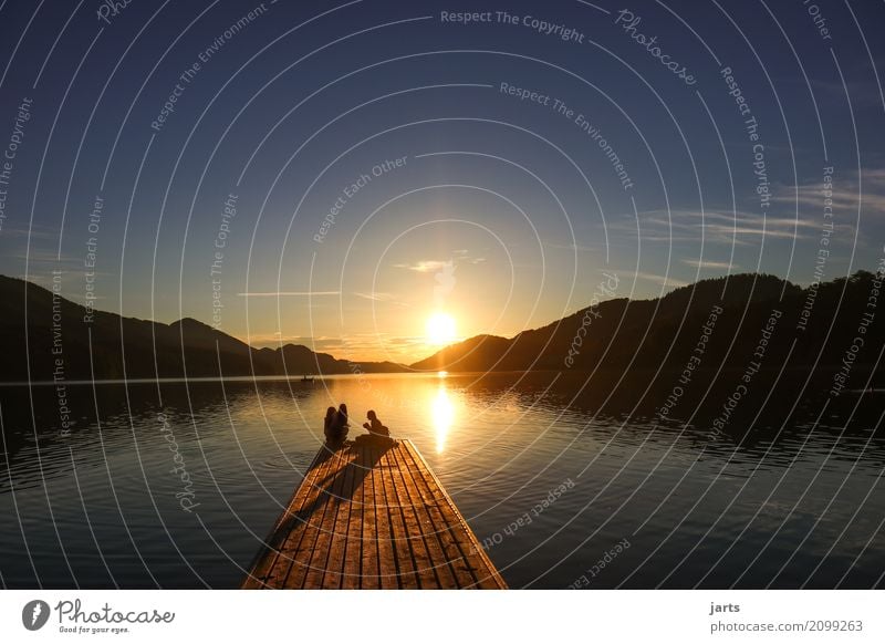 sunset at the lake Human being Feminine 3 Sunrise Sunset Summer Beautiful weather Hill Lake Sit Glittering Natural Serene Patient Calm Hope Relaxation