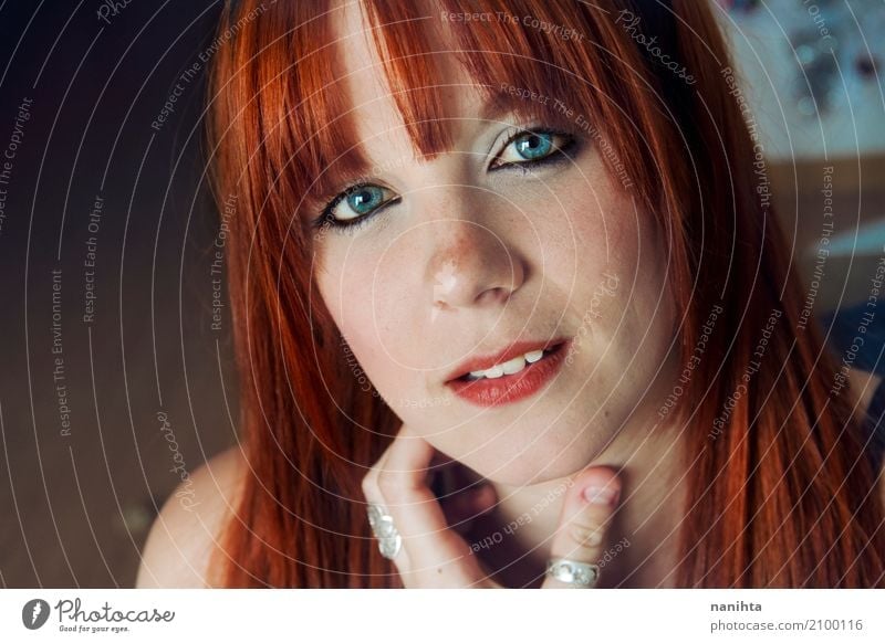 Beautiful redhead woman with blue eyes - a Royalty Free Stock Photo from  Photocase