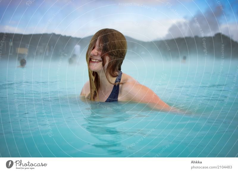 Young woman laughs in the Blue Lagoon Joy Happy Beautiful Wellness Life Harmonious Well-being Contentment Senses Relaxation Calm Swimming pool