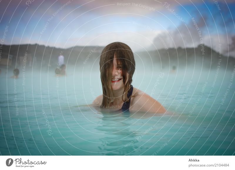 Young woman bathing in the Blue Lagoon Beautiful Wellness Harmonious Well-being Contentment Senses Relaxation Calm Spa Steam bath Whirlpool Swimming & Bathing