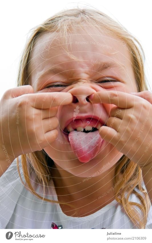 Cute girl makes faces imitate witch Face Child Schoolchild Infancy Mouth 1 Human being 8 - 13 years Blonde Smiling Blue Multicoloured White make faces toothless