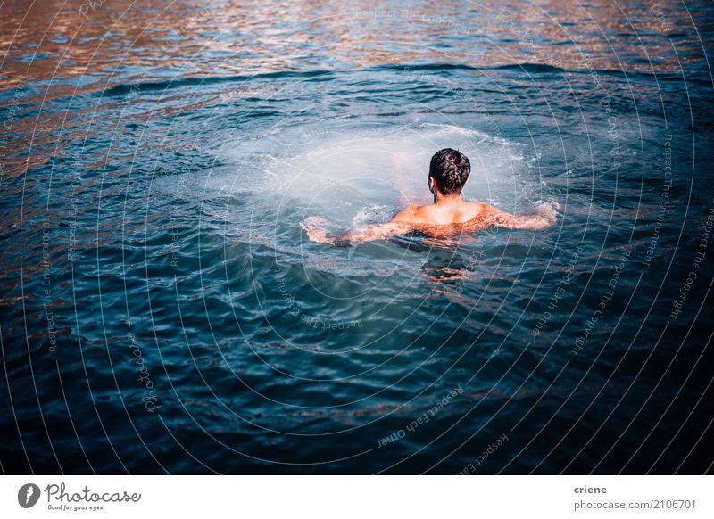 Man swimming in ocean in summer Lifestyle Joy Happy Swimming & Bathing Vacation & Travel Summer Summer vacation Sun Sunbathing Ocean Waves Sports Human being