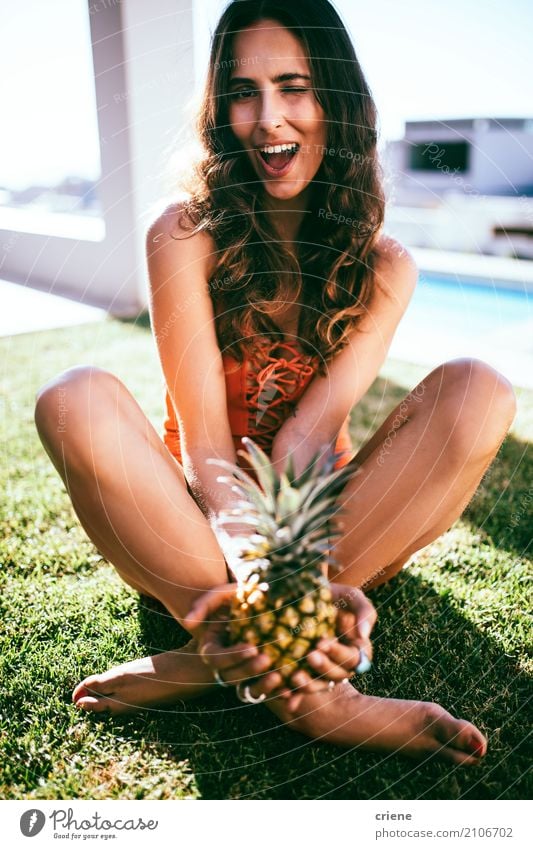 Young attractive woman sitting in garden and holding a pineapple Fruit Lifestyle Joy Happy Vacation & Travel Summer Summer vacation Garden Human being Feminine