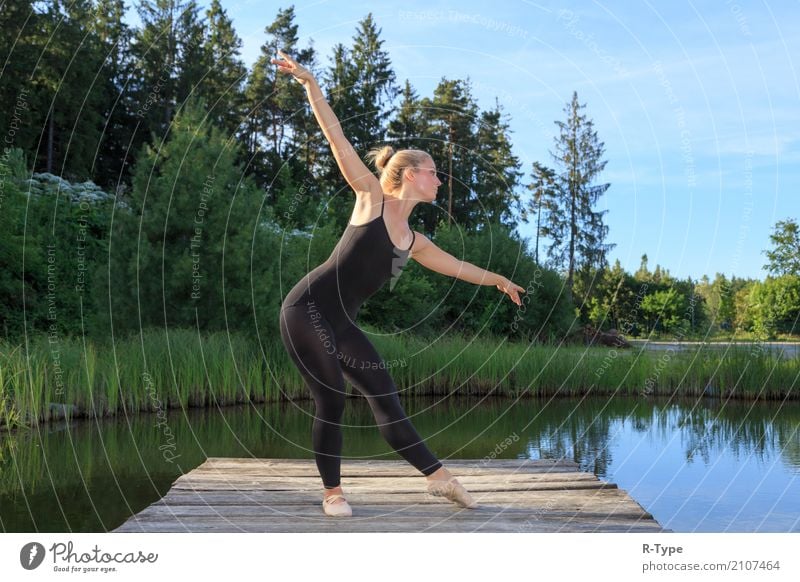 A pretty dancer dancing on a pear Lifestyle Elegant Style Sports Dance Woman Adults Artist Nature Park Fashion Blonde Fitness aerobics acrobat Action active