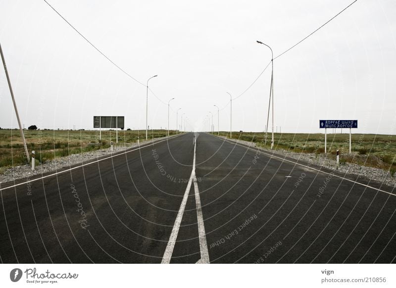 6 km from China Kazakhstan Asia Deserted Street Far-off places Infinity Cold Gloomy Future Colour photo Exterior shot Copy Space top Day Central perspective