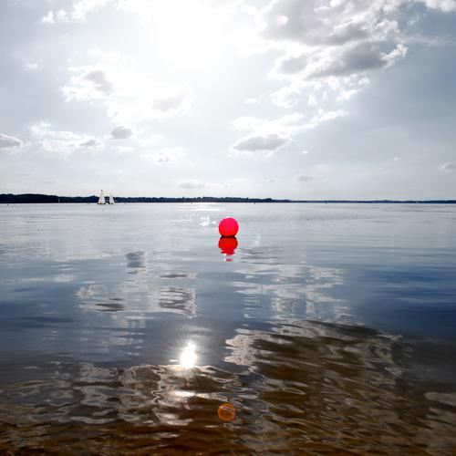 red dot dull Leisure and hobbies Boating trip Red Point Signs and labeling slack Calm Ocean Horizon Buoy Orientation Schlei Summer Colour photo Multicoloured