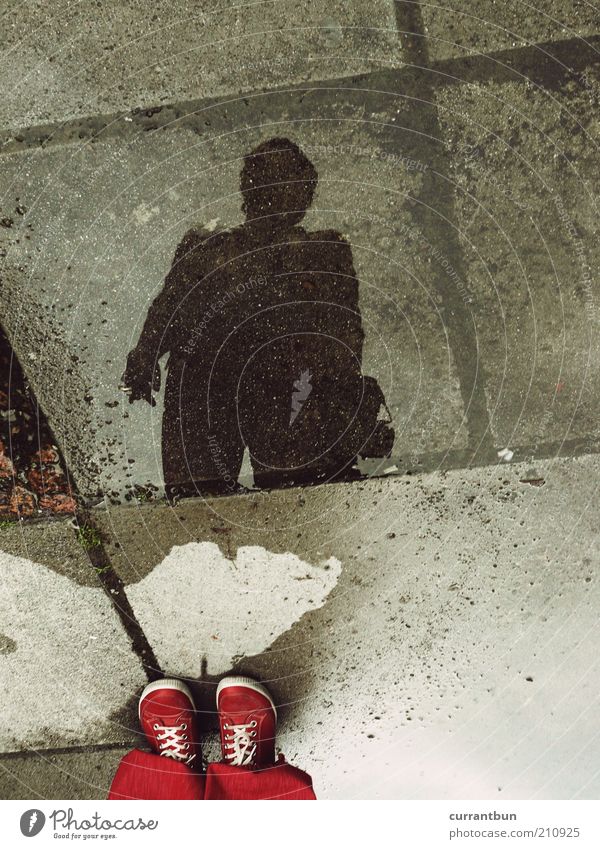 ...because you can't see the ones in the mirror image. Water Looking Wet Red Black Footwear Shadow Concrete Line Puddle Colour photo Exterior shot Experimental