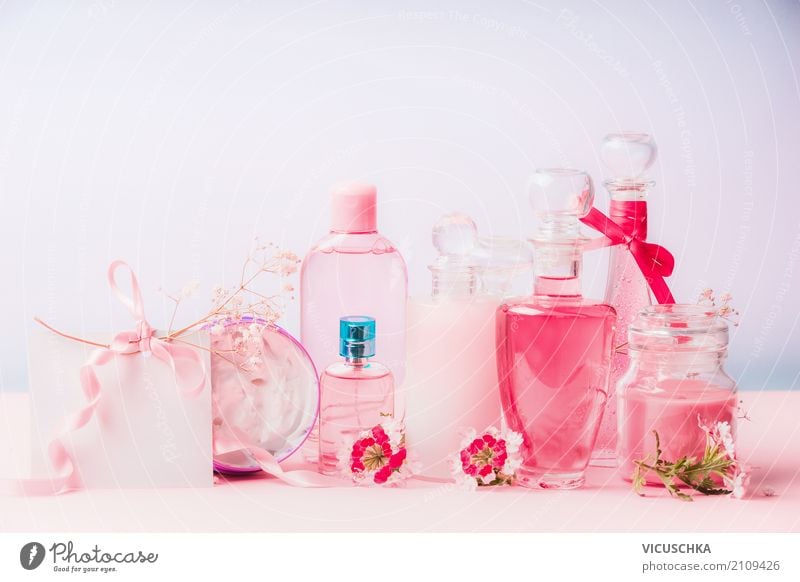 Natural cosmetic products in bottles and jars with pink flowers Lifestyle Shopping Style Design Beautiful Personal hygiene Cosmetics Perfume Cream Spa Plant