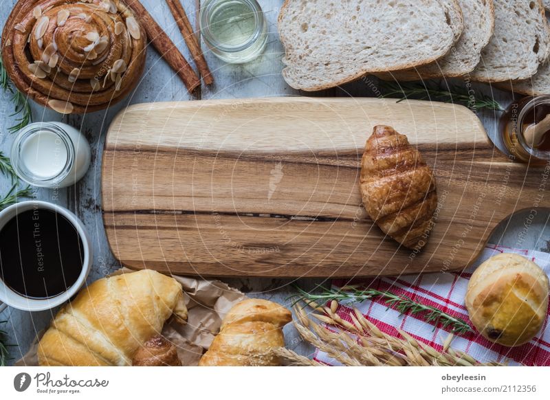 fresh bread and baked goods on wooden Croissant Eating Breakfast Lunch To have a coffee Lifestyle Art Artist Joy Colour photo Multicoloured Morning Day