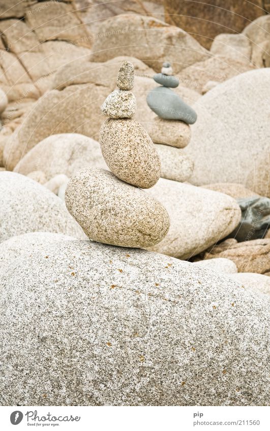 stone-age, old man Environment Landscape Elements Rock Coast Stone Heap Tower Pile of stones stone tower Cold Round Gray White Consecutively Heavy Build Stack