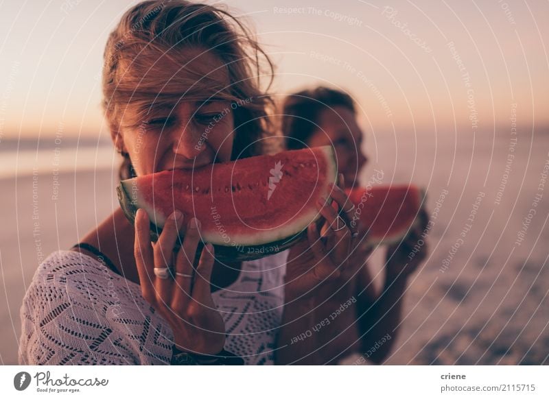 Woman eating watermelon at the beach in sunset Food Fruit Eating Lifestyle Joy Happy Healthy Eating Vacation & Travel Summer Beach Human being Feminine Adults 1