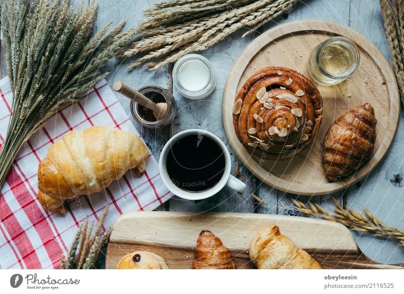 fresh bread and baked goods on wooden Dough Baked goods Bread Roll Croissant Breakfast Lunch Dinner Diet Coffee Table Kitchen Wood Fresh Natural Brown White