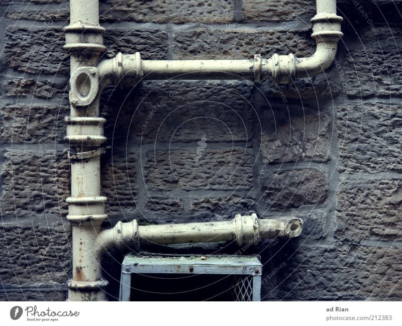 abundance Wall (barrier) Wall (building) Eaves Orderliness Colour photo Exterior shot Detail Deserted Stone wall Conduit Iron-pipe Transmission lines Connection