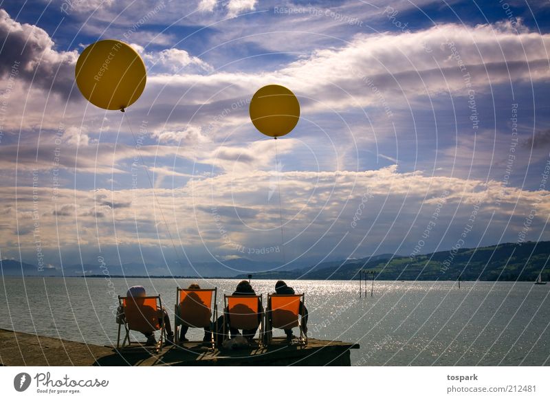 Afternoon at the lake Contentment Relaxation Calm Playing Human being Friendship 4 Water Sky Clouds Summer Beautiful weather Lake Lake Constance Balloon Observe
