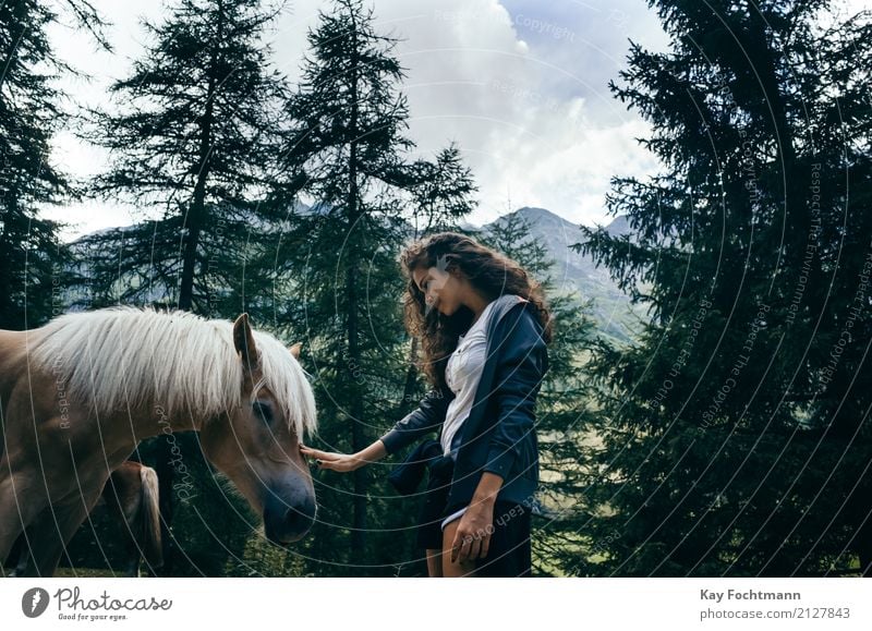 Young woman petting horse in the forest Vacation & Travel Adventure Freedom Summer Feminine Youth (Young adults) Life 1 Human being 18 - 30 years Adults