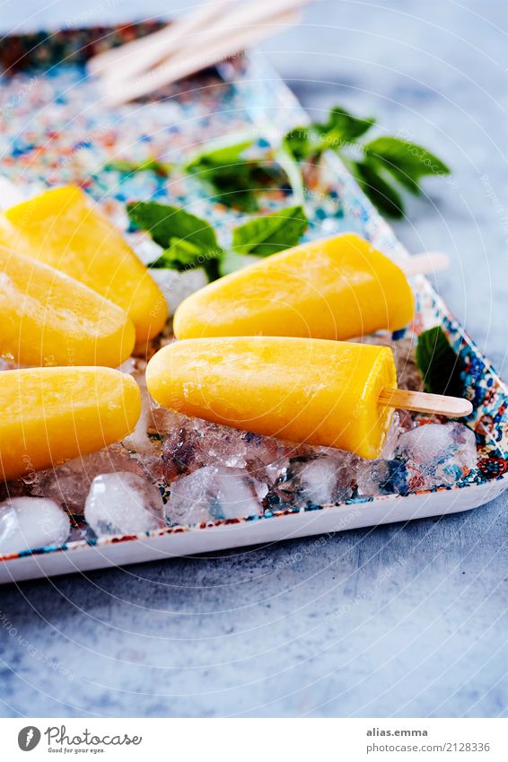 Ice on a stick Ice cream ice on a stick popsicles Orange Mango Summer Cold Frozen Self-made Delicious Fruity Food Healthy Eating Dish Food photograph ice-shaped