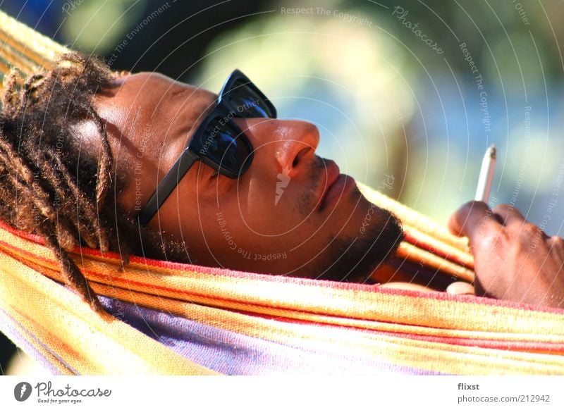 Just relax Masculine Man Adults Head 1 Human being 18 - 30 years Youth (Young adults) Sunglasses Black-haired Dreadlocks Relaxation Smoking Serene Colour photo