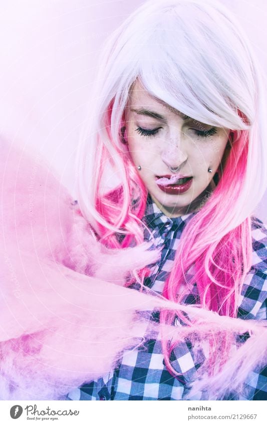 Young Alternative Woman Is Eating A Cotton Candy A Royalty Free Stock Photo From Photocase