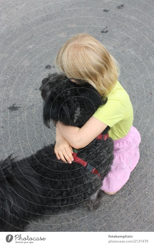 blonde babe hugs black doggy Feeling of togetherness To hold on Child Infancy Animal Watchdog Pet Dog Touch Love Embrace Together Emotions Trust Familiar