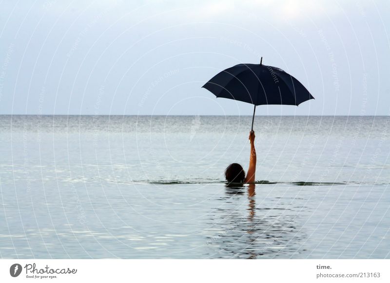 precautionary measure Swimming & Bathing Far-off places Ocean Waves Woman Adults Head Arm Water Sky Horizon Baltic Sea Umbrella Exceptional Wet Black Whimsical