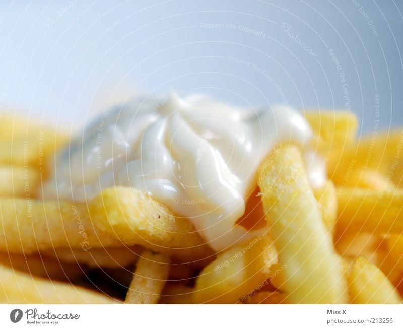 daintily Food Nutrition Lunch Dinner Fast food Hot Delicious French fries Mayonnaise Fat Unhealthy Colour photo Multicoloured Close-up Macro (Extreme close-up)