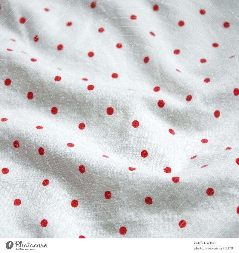 wrinkled points Decoration Cuddly Soft Red White Relaxation Colour Bedclothes Blanket Bolster Point Polka dot Wrinkles Textiles Cloth Cloth pattern Colour photo