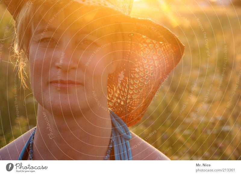 just a day Summer vacation Feminine Woman Adults Head Face Nature Beautiful weather Wild plant Meadow Hat Blonde Natural Warmth Sunhat Straw hat Twilight
