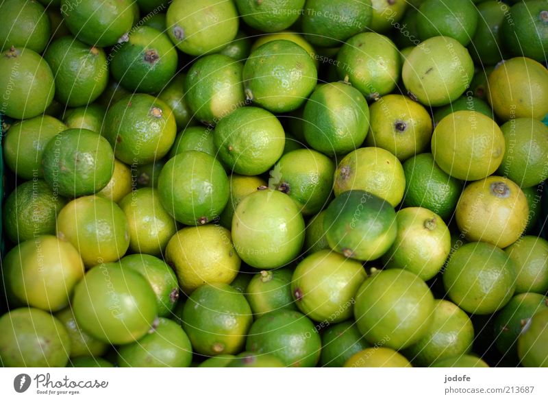 limes Fruit Yellow Green Many Multiple Sour Vegetarian diet Lime Colour photo Multicoloured Exterior shot Deserted Day Shadow Shallow depth of field Round